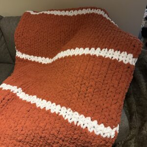 Hand-knit adult throw orange stripe blanket