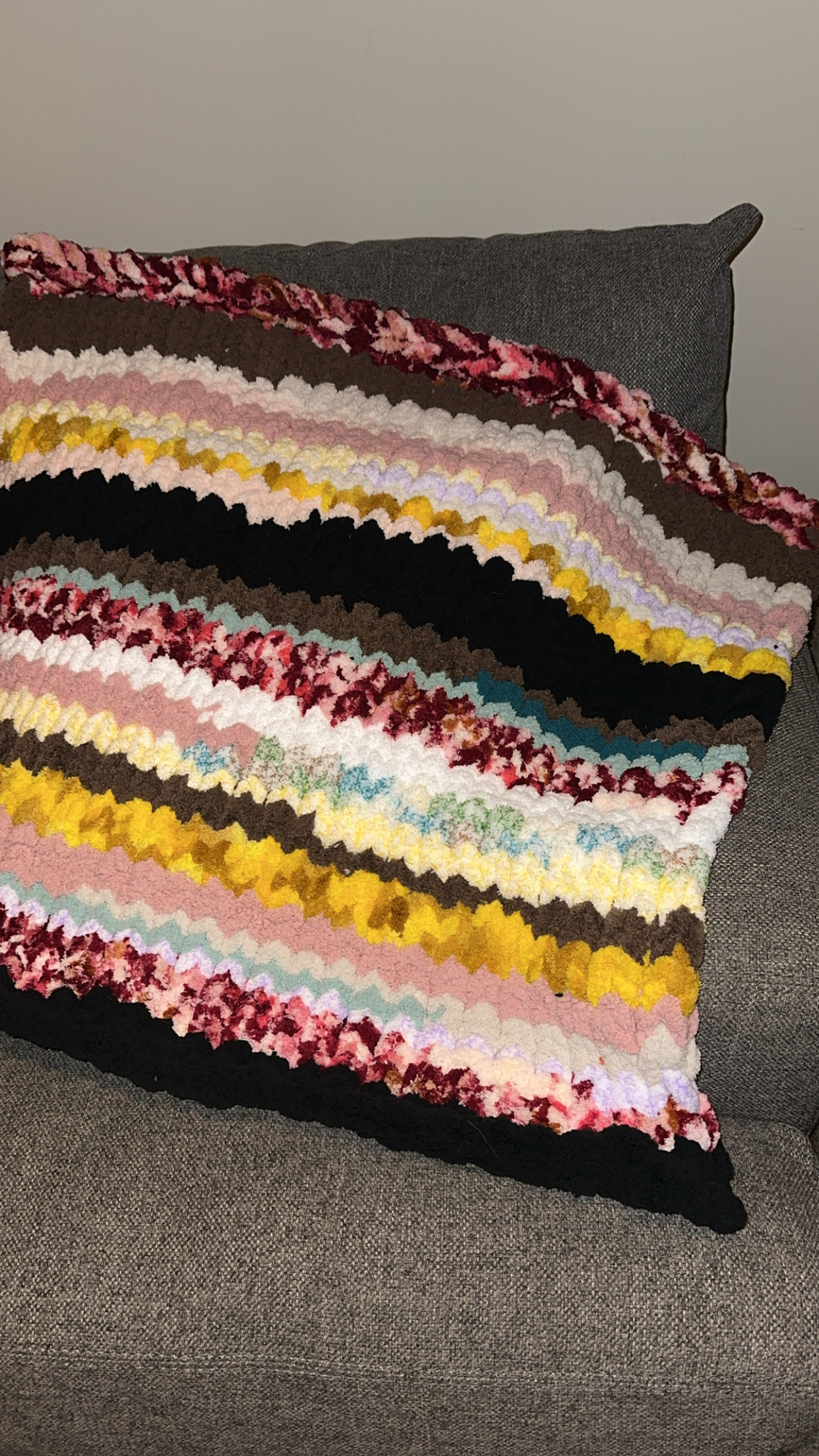 Hand-knitted striped baby blanket